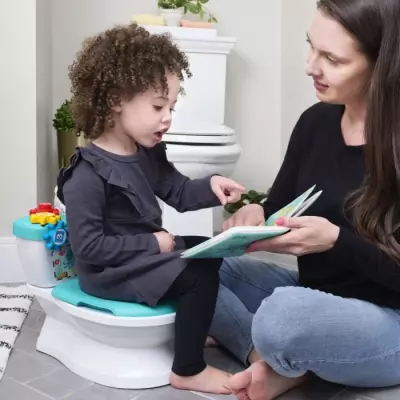 Toilette pour bébé avec réducteur et chasse d'eau musicale