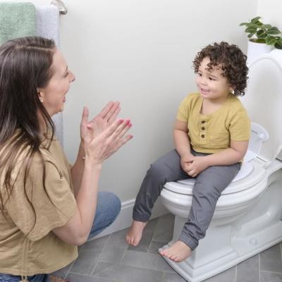 Réducteur de Toilette Ingenuity Flip & Sit - Fixation Adhésive