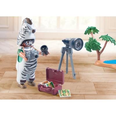 Photographe avec déguisement et zèbres pour univers miniature